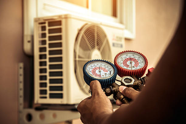 Professional Air Conditioning Service technician working in Birmingham, NJ